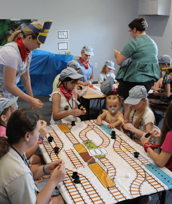 Kids at church playing trains
